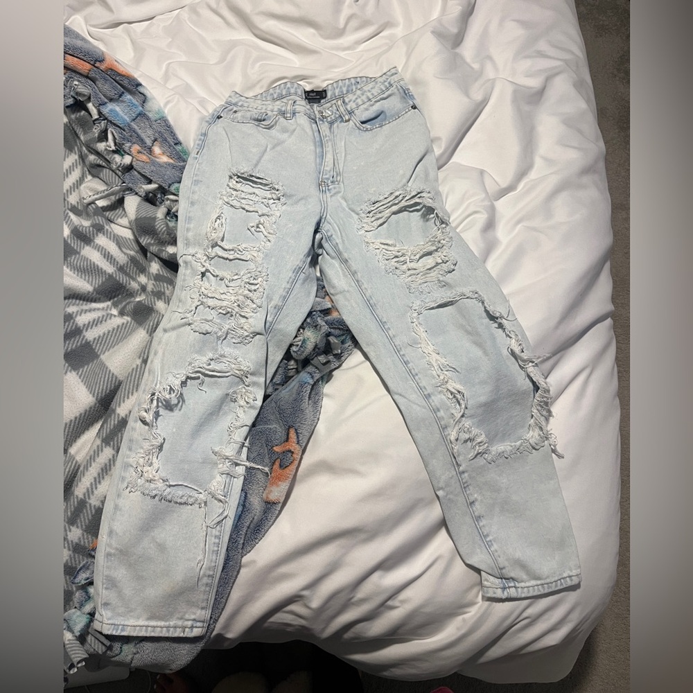 Extremely Ripped Jeans - Picture 2 of 3
